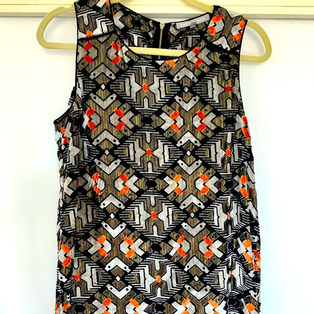 beautiful velvet and crepe sleeveless blouse.